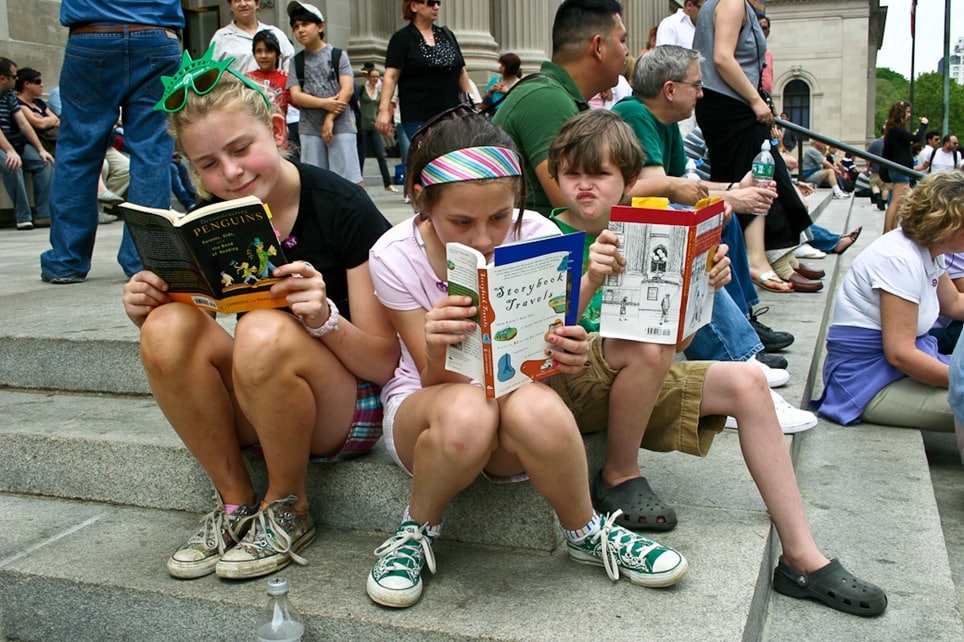 Children Reading Books In Library