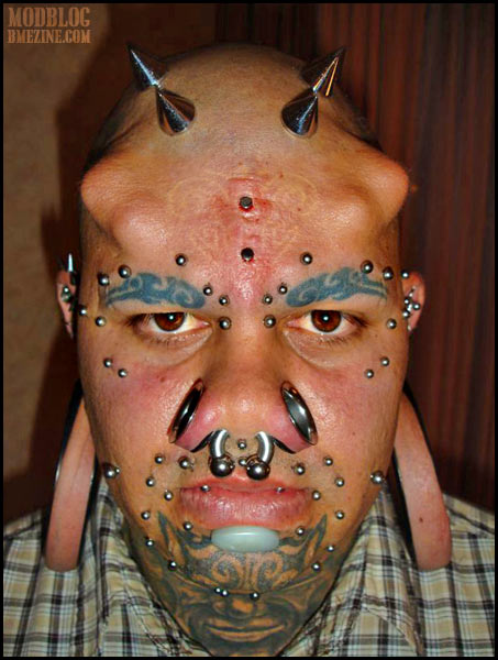 Devil Horns Tattoo Forehead