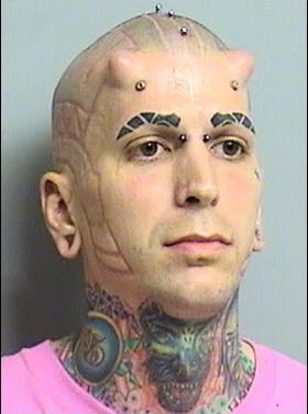 Devil Horns Tattoo Forehead